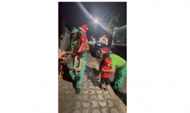 Família faz ceia de Natal para garis