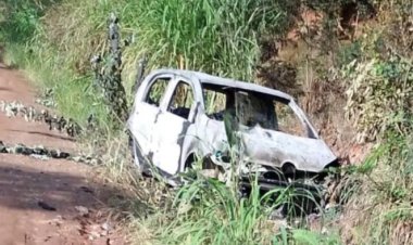 Mulher bate carro em barranco